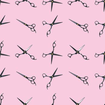 Seamless pattern of black scissors. professional hairdresser black scissors isolated on pink. Black barber scissors, close up. pop art background, for prints or posters