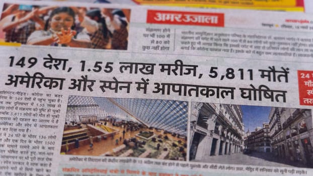 Dehradun, Uttarakhand India June 28, 2021. Hindi, Coronavirus COVID-19 News Headline in Newspaper of India. Headlines of the month March, April 2020.