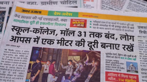 Dehradun, Uttarakhand India June 28, 2021. Hindi, Coronavirus COVID-19 News Headline in Newspaper of India. Headlines of the month March, April 2020.