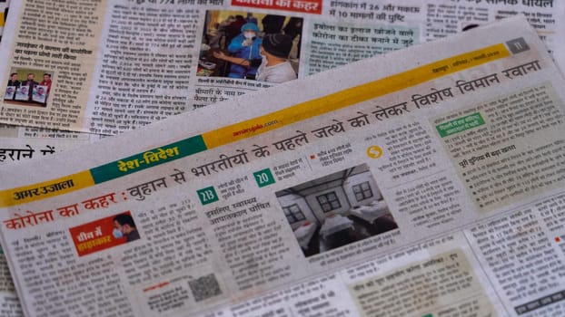 Dehradun, Uttarakhand India June 28, 2021. Hindi, Coronavirus COVID-19 News Headline in Newspaper of India. Headlines of the month March, April 2020.