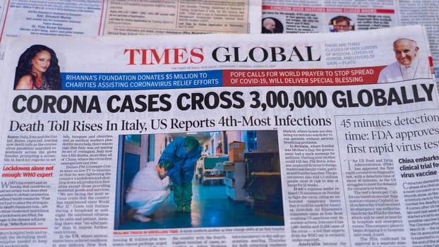 Dehradun, Uttarakhand India June 28, 2021. Coronavirus COVID-19 News Headline in Newspaper of India. Headlines of the month March, April 2020. High-quality apple prores 422 4k footage 60p.