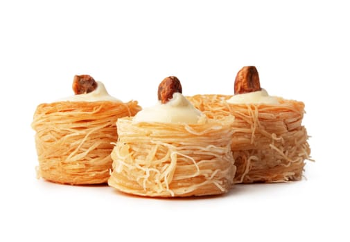 Baklava dessert with pistaccio isolated on white background, close up
