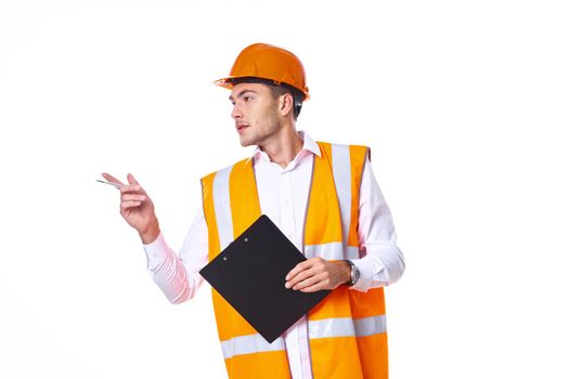 man in orange hard hat engineer work professionals construction. High quality photo