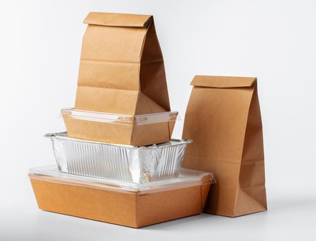 Set of recyclable food packaging on white background close up