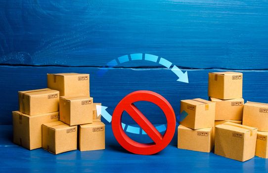 Arrows between boxes and prohibition symbol NO. Trade wars. Ban on imports and exports. Sanctions and embargoes. Termination of a trade agreement, closure of economic relations. Trading imbalance
