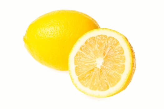 Lemon with leaves on white with leaves on white