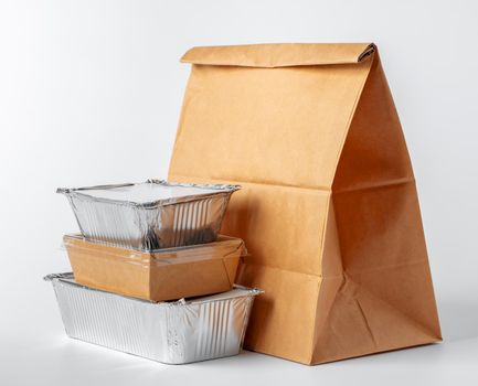 Set of recyclable food packaging on white background close up