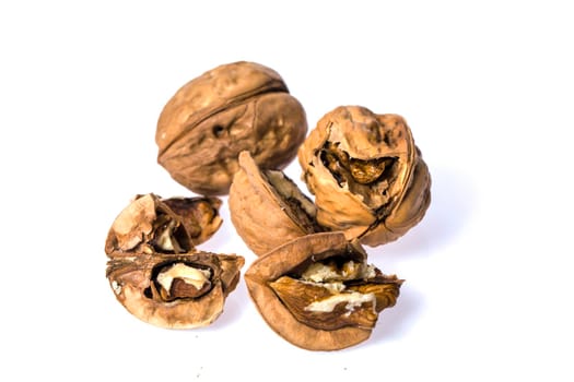 Single walnut isolated on a white background.