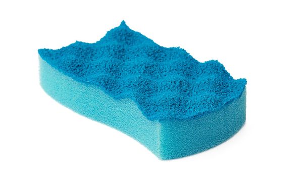Sponge for dish cleaning isolated on white background, close up