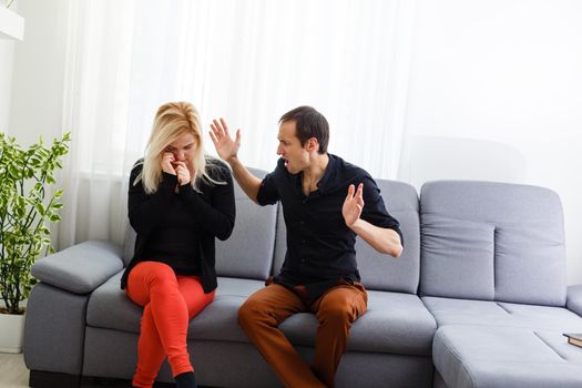 Young couple with relationship difficulties during therapy session.