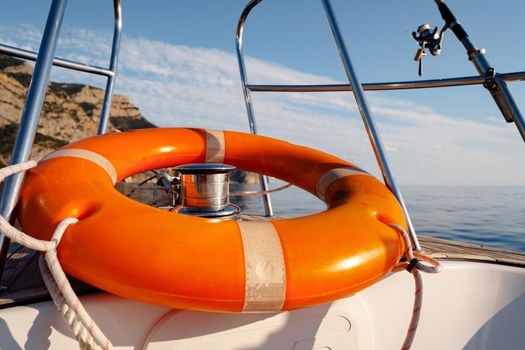 Lifebuoy saver ring on sailboat in the open sea