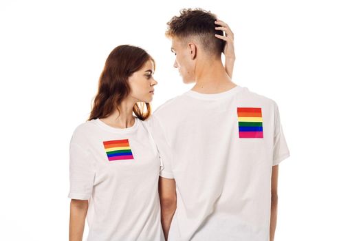 young couple lgbt Flag transgender lifestyle light background. High quality photo