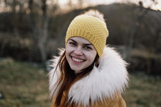 woman outdoors in jacket walk autumn fresh air. High quality photo