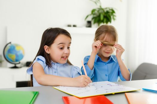 Learning from home, Home school kid concept. Little children study online learning from home with laptop. Quarantine and Social distancing concept.