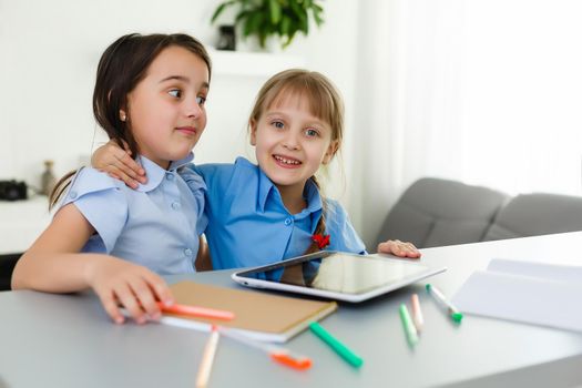 Learning from home, Home school kid concept. Little children study online learning from home with laptop. Quarantine and Social distancing concept.