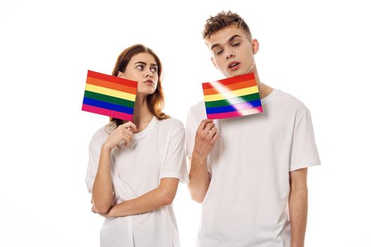 young couple lgbt Flag transgender lifestyle light background. High quality photo