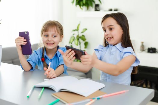 two little girls studying online. Distance Learning Online, e-learning, concept