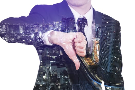 Double exposure of business man showing thumbs down gesture against the city isolated on white background