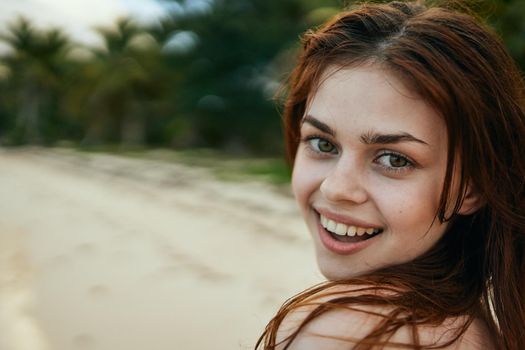 woman in blue swimsuit on the beach island lifestyle. High quality photo