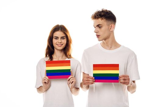 young couple lgbt Flag transgender lifestyle light background. High quality photo