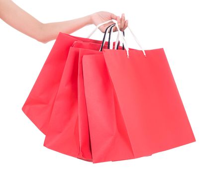hand holding shopping bag isolated on a white background