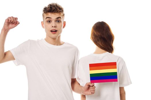 young couple lgbt Flag transgender lifestyle light background. High quality photo