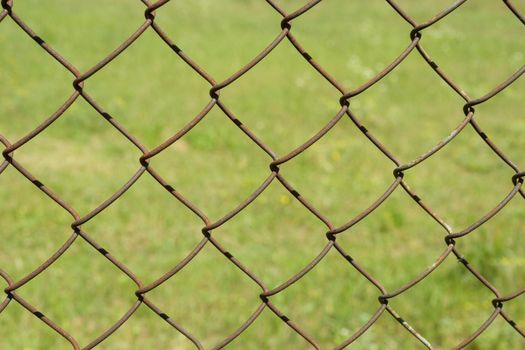 Texture background abstract old mesh metallic fence.