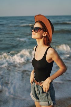 pretty woman on the beach summer vacation lifestyle sun. High quality photo