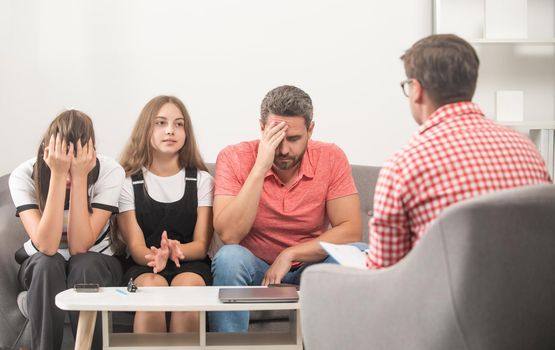 parents with kid talk to social worker. mom dad and daughter. life insurance and adoption. parent-teacher meeting. parenthood. upset father mother and child at psychologist session. family therapy.