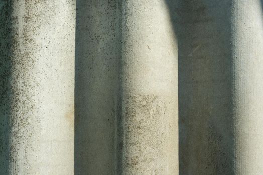 Grey textured concrete cement wall closeup background,