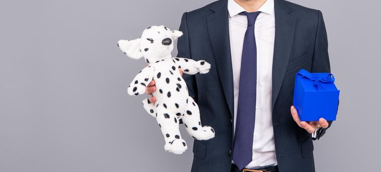 cropped businessman in suit with present box. shopping sale and discount. business man hold toy gift. boxing day. copy space.