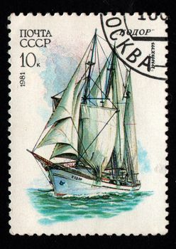 USSR - CIRCA 1981: sailing ship schooner Kodor on a USSR postage stamp. Soviet sailboat on a postage stamp. Sea transport on postage stamp. Old Soviet postage dedicated to Soviet ships. Philately