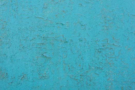 Texture background blue painted cracked iron surface