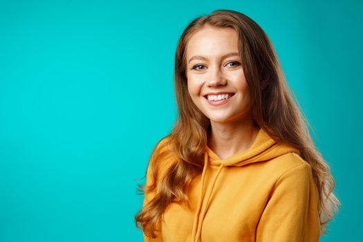 Portrait of a young beautiful happy woman smiling close up