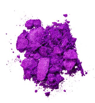Smashed eyeshadows of bright purple color, make up concept