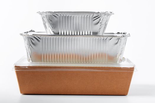 Assortment of food delivery containers on white background close up