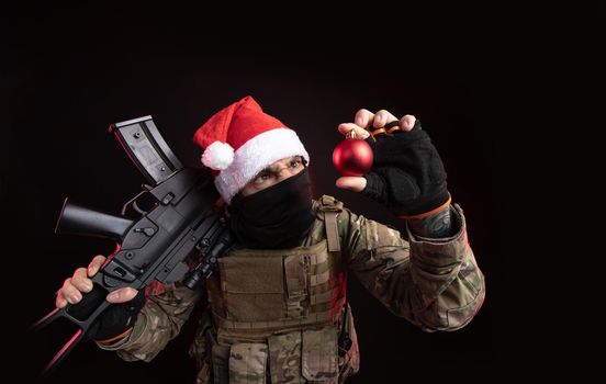 the man in a military uniform with a gun in hand Christmas toy