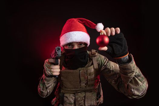 the man in a military uniform with a gun in hand Christmas toy