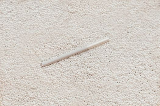 white long cigarette with filter on white bubbles - cigarette with white background