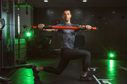 the man engaged in the gym