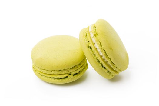 French colored macaroon cookie isolated on white background