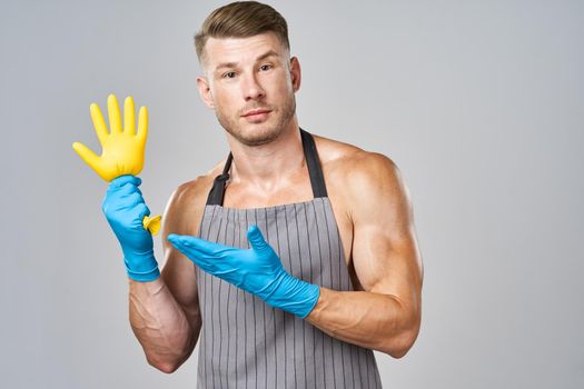male cleaner rubber gloves posing service housework. High quality photo