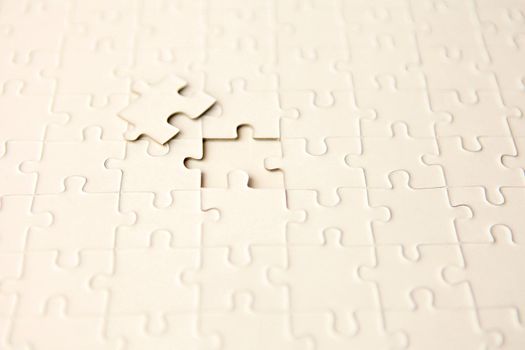 plan white puzzle surface texture with copy space. puzzle with missing piece - solution concept