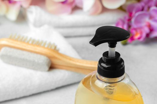Liquid soap or body lotion set at hotel bathroom, close up