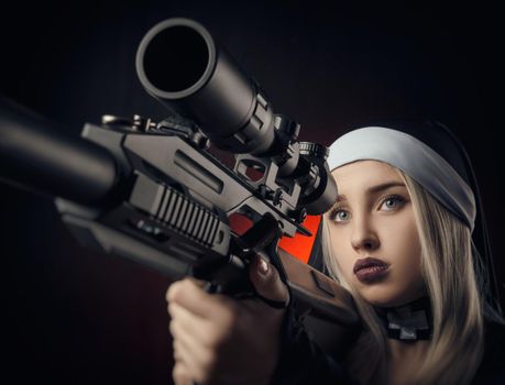 girl on a black background in a nun dress posing with a gun, aiming, shooting
