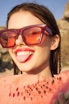 woman eating watermelon outdoors Sun summer close-up. High quality photo