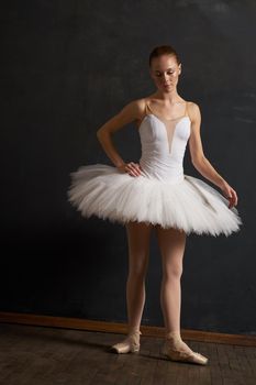 ballerina dance classic performance the dark background. High quality photo