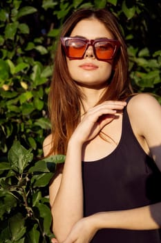 pretty woman in black swimsuit posing fashion summer. High quality photo