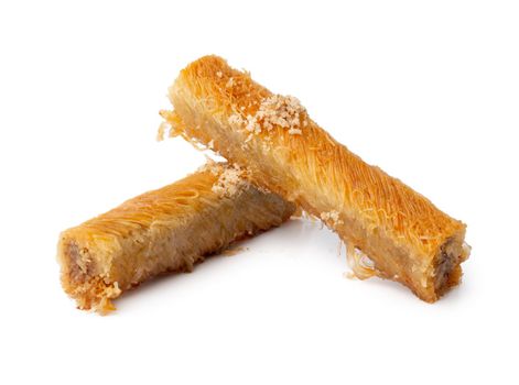 Turkish sweet pastry baklava isolated on white background, close up