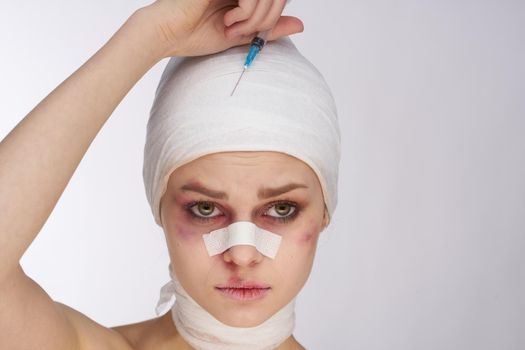 female patient bruised face medicine treatment injury studio lifestyle. High quality photo